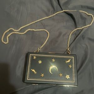 Black bag with moon and stars design